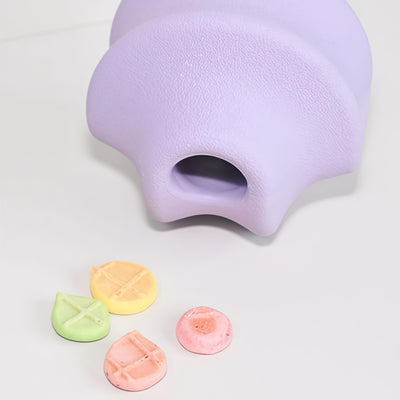 Twist Toss Treat-Holding Fetch Toy